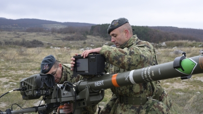 Припадници...