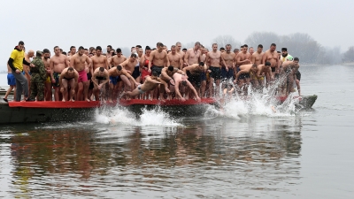 Members of the Serbian Armed Forces Swimming for the Holy Theophany Cross Across Serbia