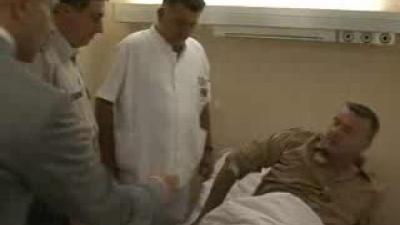 Visiting the injured pilot at MMA